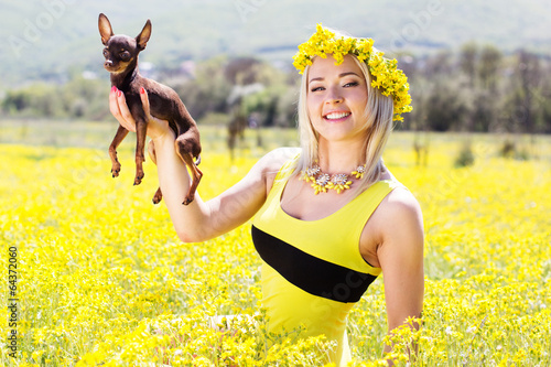 Photo: Pretty girl on the nature with her dog Pretty girl on the nature with her dog