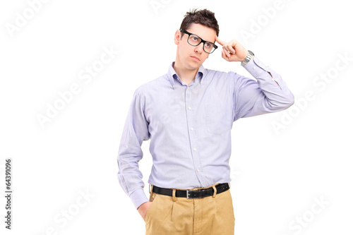 Photo: Young man trying to remember something Young man trying to remember something