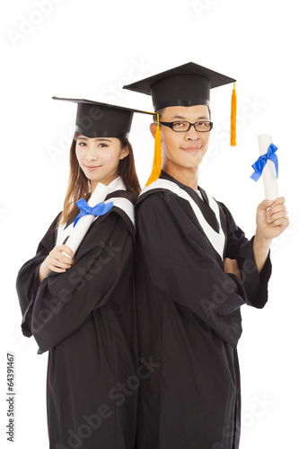 Photo: happy graduating students isolated on white happy graduating students isolated on white