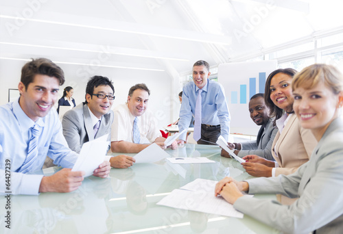 Photo: Group of Business People Having a Meeting Group of Business People Having a Meeting