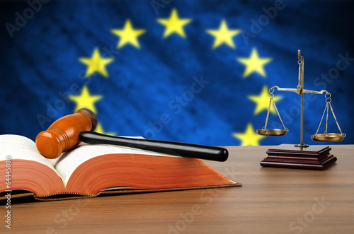 Photo: Still life photo of a gavel, scales of justice and law book Still life photo of a gavel, scales of justice and law book