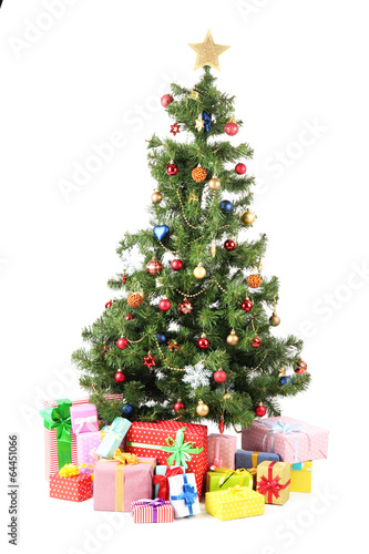 Photo: Decorated Christmas tree with gifts isolated on white Decorated Christmas tree with gifts isolated on white