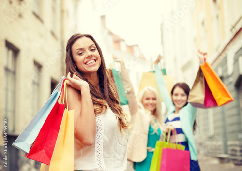 Photo: beautiful woman with shopping bags in the ctiy beautiful woman with shopping bags in the ctiy