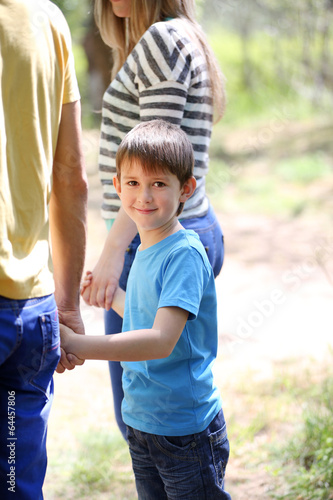 Photo: Happy family, walk in the park Happy family, walk in the park