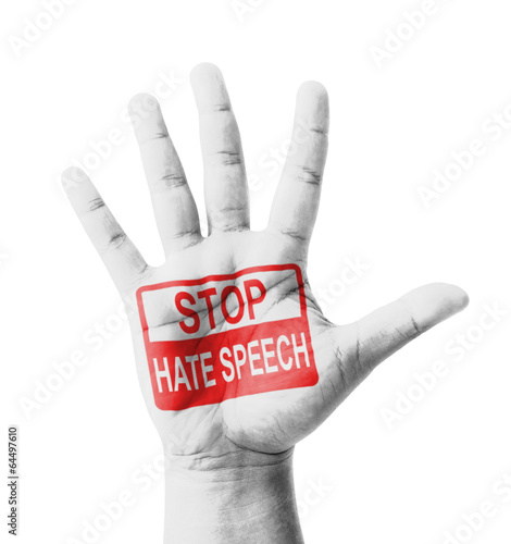 Photo: Open hand raised, Stop Hate Speech sign painted Open hand raised, Stop Hate Speech sign painted
