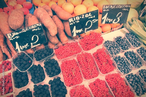 Photo: Fruit market retro. Cross processing color tone. Fruit market retro. Cross processing color tone.