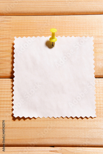 Photo: Empty paper sheet on wooden background Empty paper sheet on wooden background