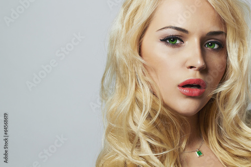 Photo: young woman with beautiful healthy face. Curly blond hair young woman with beautiful healthy face. Curly blond hair