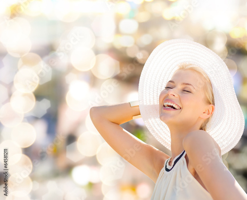 Photo: beautiful woman enjoying summer outdoors beautiful woman enjoying summer outdoors