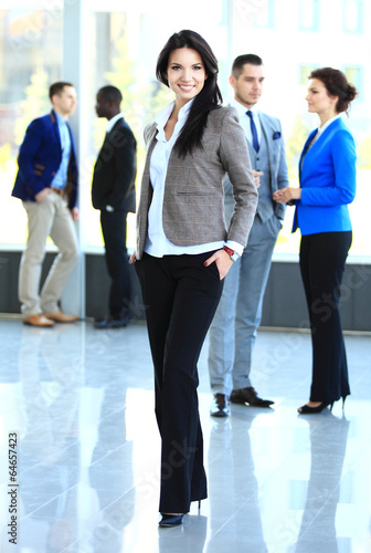 Photo: beautiful businesswoma in office beautiful businesswoma in office