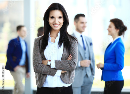 Photo: Face of beautiful businesswoma in office Face of beautiful businesswoma in office