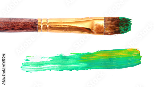 Photo: Abstract gouache paint and brush, isolated on white Abstract gouache paint and brush, isolated on white
