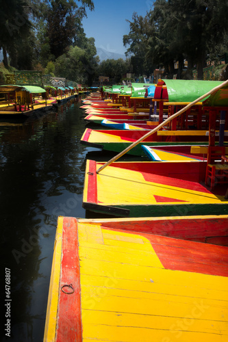 Photo: Boats in a lake, Xochimilco, Mexico City, Mexico Boats in a lake, Xochimilco, Mexico City, Mexico