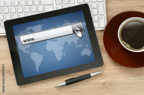 Photo: Tablet PC on Table with Websearch Tablet PC on Table with Websearch