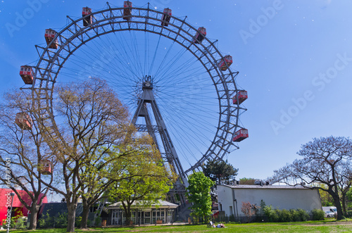 Photo: Viennese giant wheel in Prater amusement park at Vienna Viennese giant wheel in Prater amusement park at Vienna