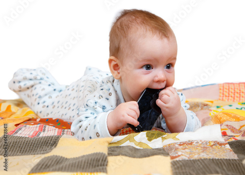 Photo: Baby with smartphone in his mouth Baby with smartphone in his mouth