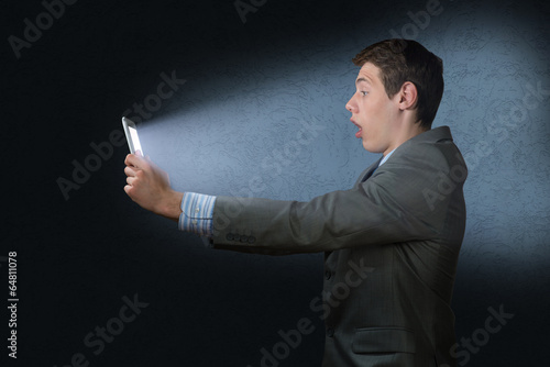 Photo: businessman with a tablet computer businessman with a tablet computer