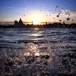 waves splashing on a beautiful sunset above Venice waves splashing on a beautiful sunset above Venice