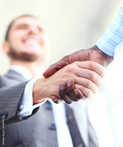 Photo: Business people shaking hands Business people shaking hands