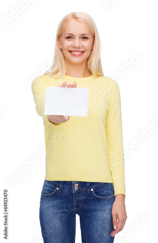 Photo: smiling girl with blank business or name card smiling girl with blank business or name card
