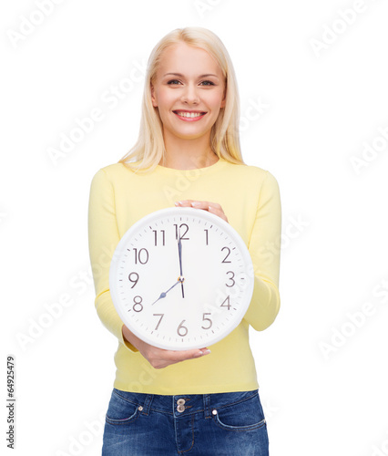 Photo: student with wall clock student with wall clock