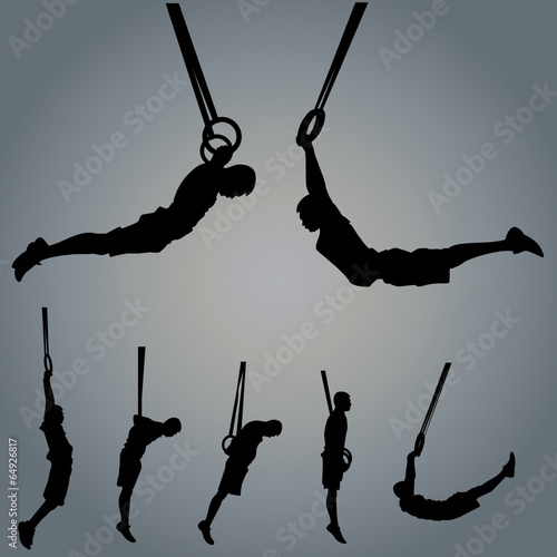 Vector: Sportsman silhouette with gymnastic rings Sportsman silhouette with gymnastic rings