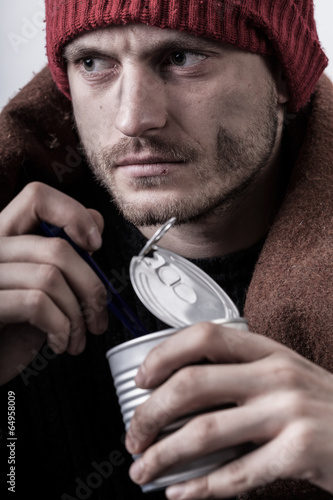 Photo: Poor man eating preserve Poor man eating preserve