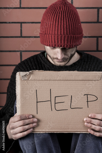 Photo: Man begging for help Man begging for help