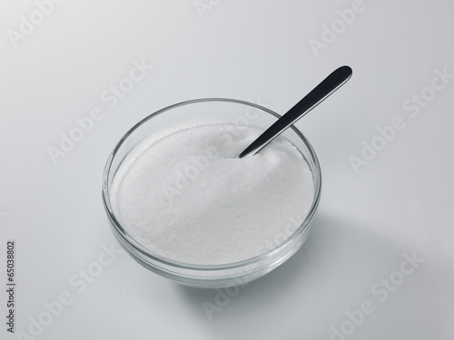 Photo: granulated sugar and spoon granulated sugar and spoon