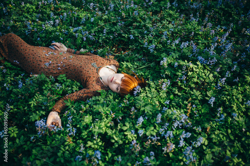 Photo: Beautiful young woman in the forest Beautiful young woman in the forest