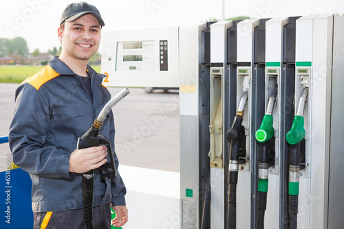 Photo: Man working at a gas station Man working at a gas station