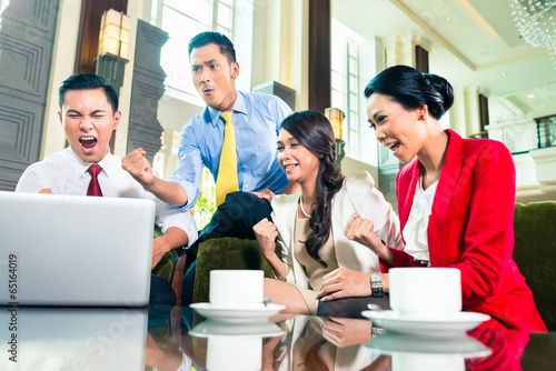 Photo: Asian businesspeople having meeting Asian businesspeople having meeting