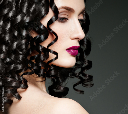 Photo: beautiful brunette with gorgeous curly hair beautiful brunette with gorgeous curly hair