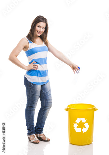 Photo: Beautiful young woman recycling Beautiful young woman recycling