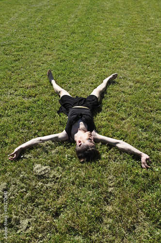 Photo: Drag queen relaxing on the grass Drag queen relaxing on the grass