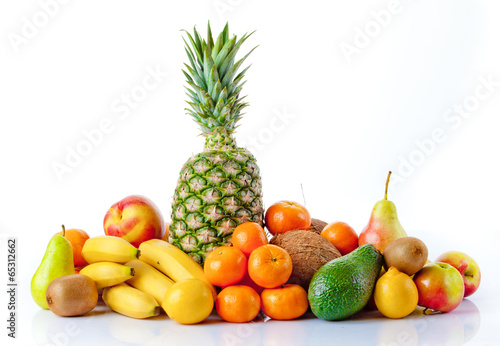 Photo: Fresh fruits isolated on a white . Set of different fresh fruits Fresh fruits isolated on a white . Set of different fresh fruits