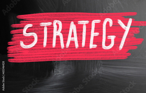 Photo: strategy handwritten with chalk on a blackboard strategy handwritten with chalk on a blackboard