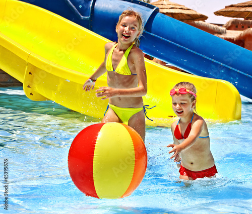 Photo: Children swimming in pool. Children swimming in pool.