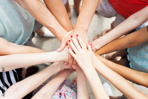 Photo: Hands joined in unity Hands joined in unity