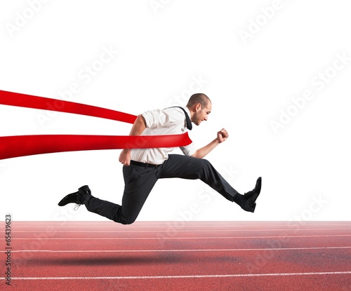 Photo: Successful businessman on the finishing line Successful businessman on the finishing line