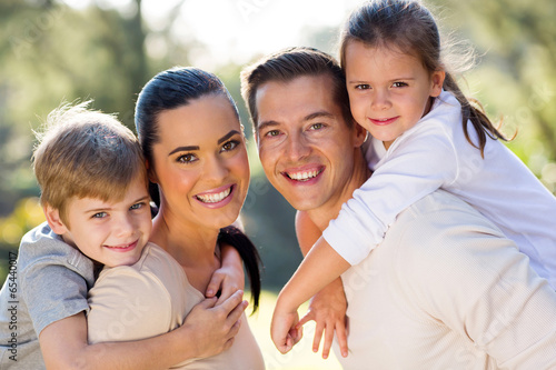 Photo: lovely family together outdoors lovely family together outdoors