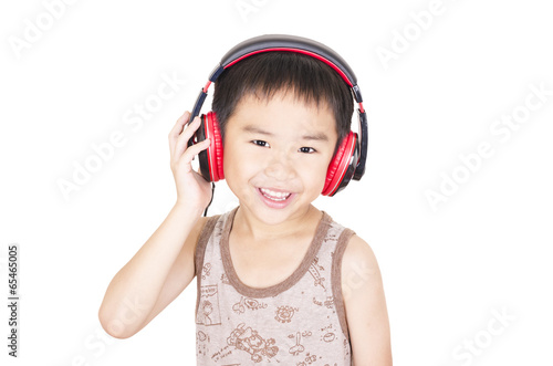 Photo: Cute children listen to music Cute children listen to music