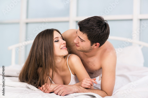 Photo: Romantic scene in bedroom Romantic scene in bedroom