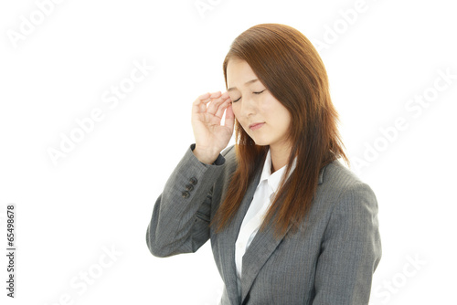 Photo: 頭痛に悩む女性 頭痛に悩む女性