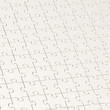 Surface covered with puzzle pieces Surface covered with puzzle pieces