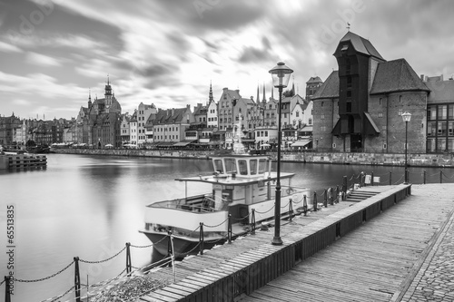 Fototapeta The medieval port crane over Motlawa river in Gdansk, Poland