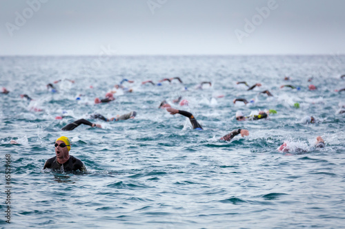 Photo: Triathletes at Ironman triathlon competition at Calella Triathletes at Ironman triathlon competition at Calella
