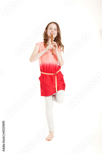 Photo: young girl with soprano recorder young girl with soprano recorder