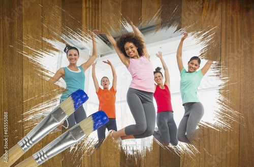 Photo: Composite image of fitness class at the gym Composite image of fitness class at the gym