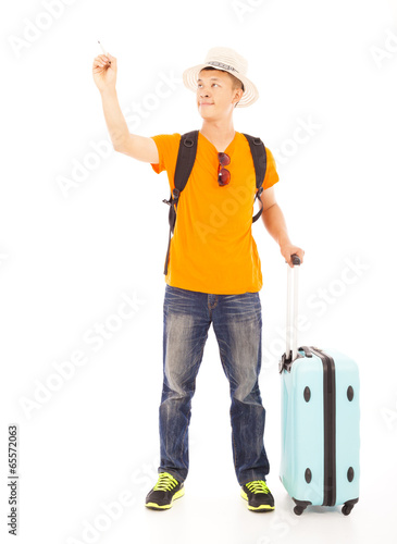 Photo: happy young man standing and raise a hand to draw happy young man standing and raise a hand to draw